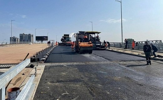 На новом Яблоновском мосту подрядчик начал укладку нижнего слоя покрытия асфальтобетона мостового полотна
